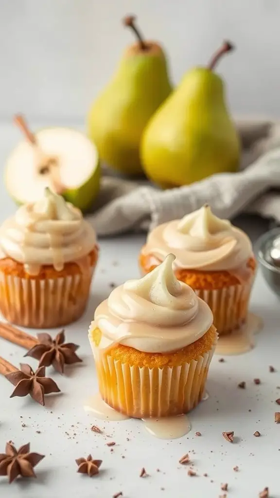 Spiced pear cupcakes with honey glaze, fresh pears, and spices