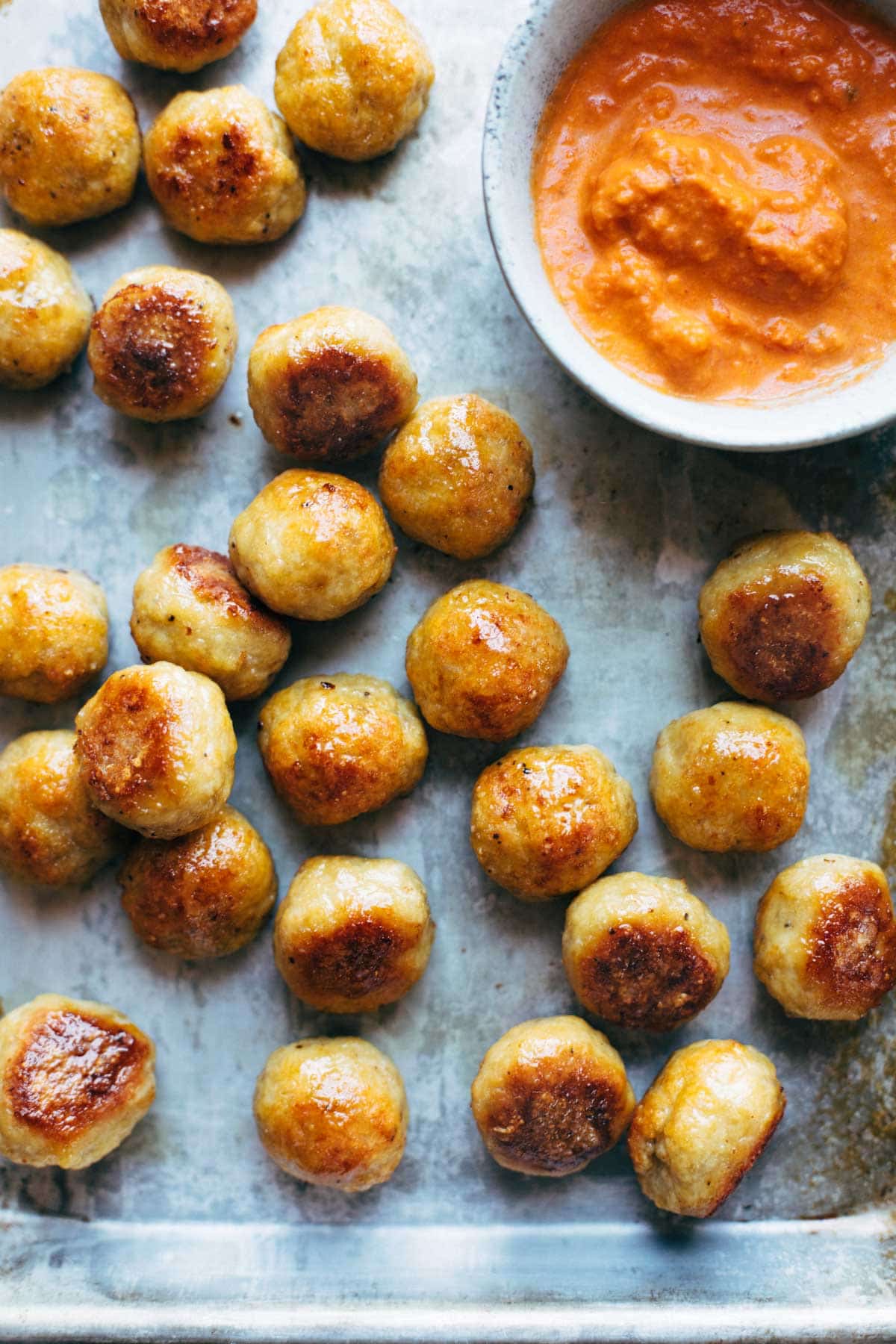 Pan Seared Chicken Meatballs with Creamy Red Sauce