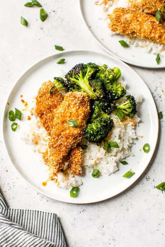 Crispy Sesame Sesame Chicken Tenders with Broccolini